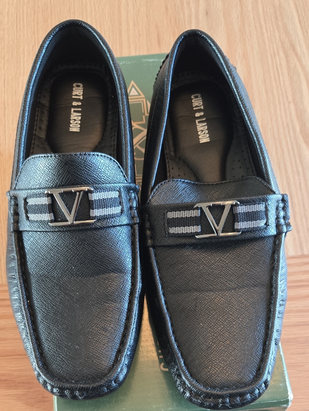 Black Men’s Slip-On Loafers with Silver Accent